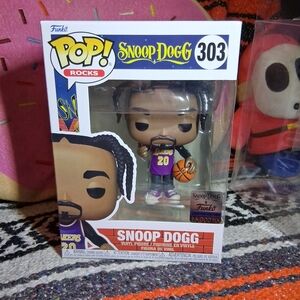 Funko Pop Rocks Snoop Dogg in Purple and Yellow